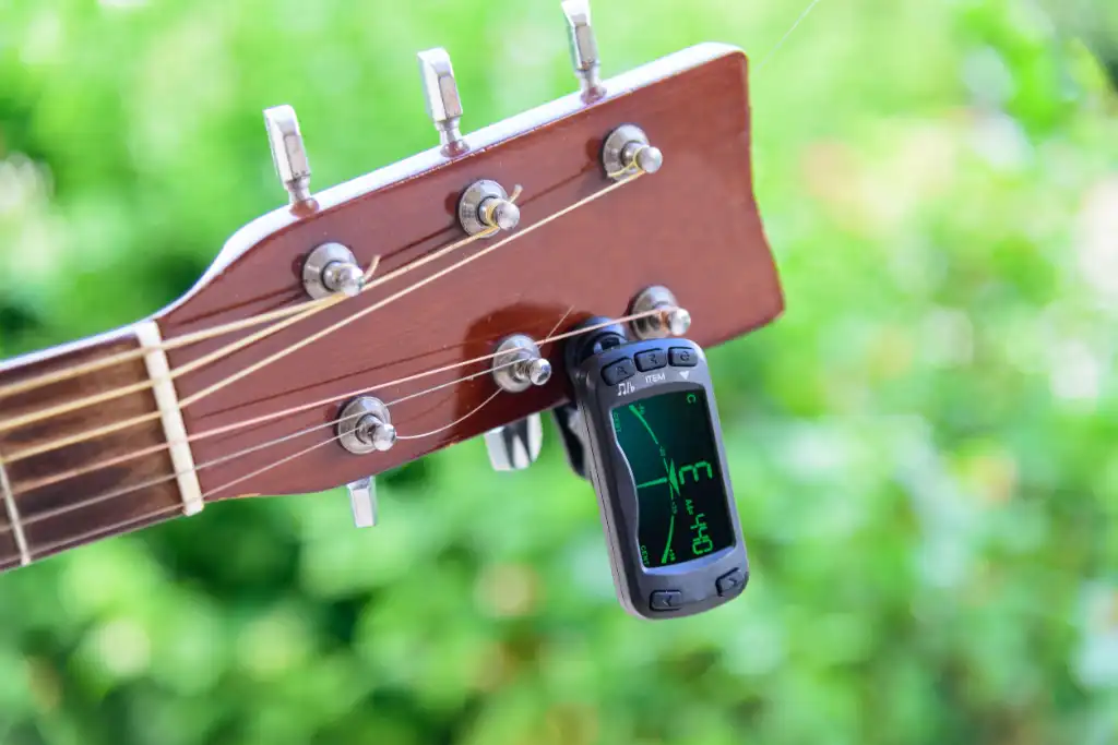 donde colocar el Afinador electrónico para guitarra